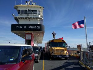 Sport bus on a ferry